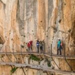 Aerial view of the Caminito del Rey in Málaga, Spain, with suspended walkways over the Gaitanes Gorge and stunning natural landscapes.