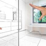 Reforma de baño moderno en Madrid con presupuesto bajo y diseño funcional.