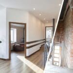 Imagen de un piso antiguo reformado en Madrid que combina elementos originales como suelos de madera y molduras con un diseño interior moderno y funcional