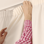 Arreglos de ropa de hogar en cortinas y textiles interiores.