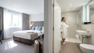 ¿Qué son las habitaciones con baño y por qué son importantes para su estancia?